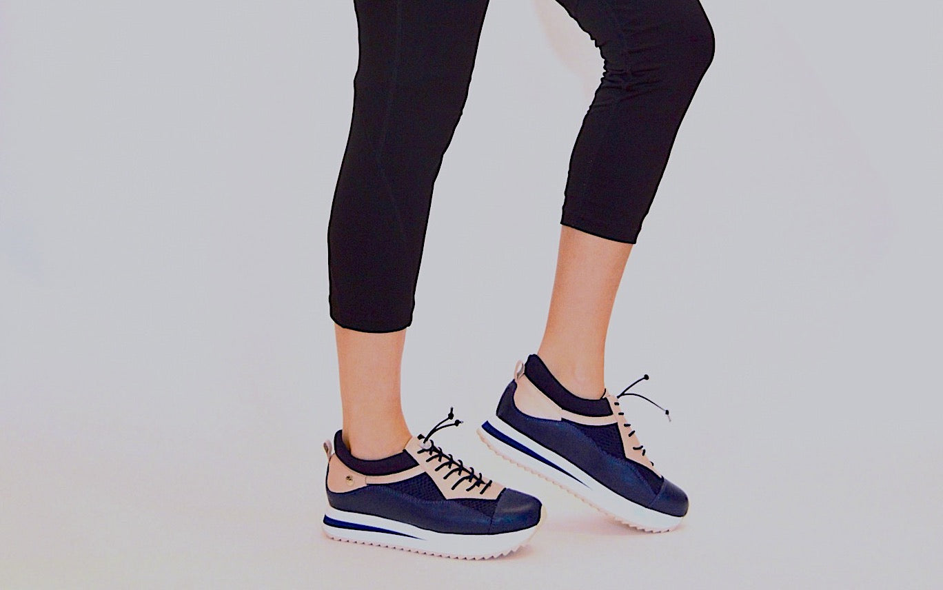 Rosegold and Navy casual sneakers by Chelsea Jones. Elevate the everyday in shoes that provide comfort and style.